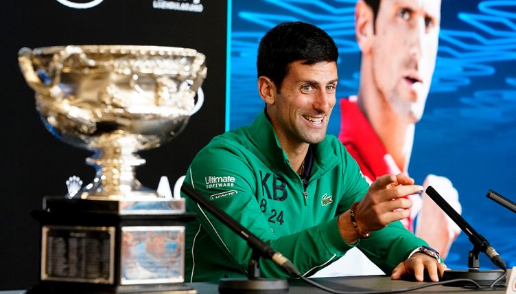 Novak Djokovic laughing at Australian Open press conference