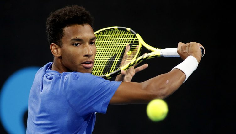 Felix Auger-Aliassime in action