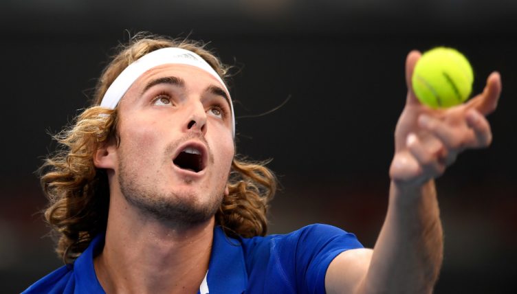 Stefanos Tsitsipas serving