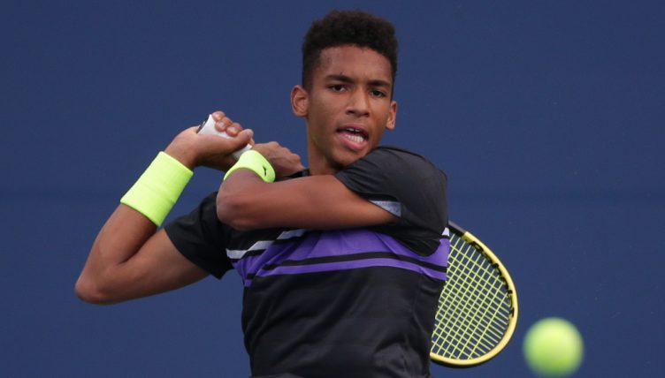 Felix Auger-Aliassime in action