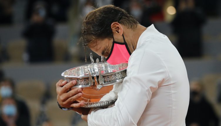 Rafael Nadal hugs French Open trophy