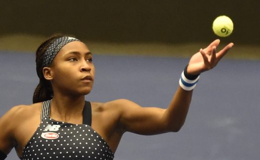 Coco Gauff serving