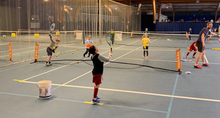 Children playing tennis