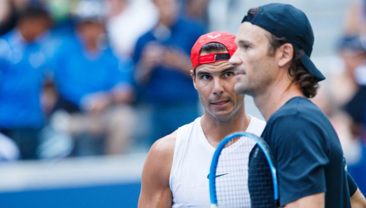 Rafael Nadal and Carlos Moya talking tactics