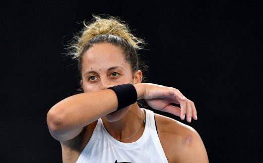 Madison Keys wipes her face