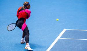 PICS: Serena Williams dons one-legged catsuit and produces 'vintage