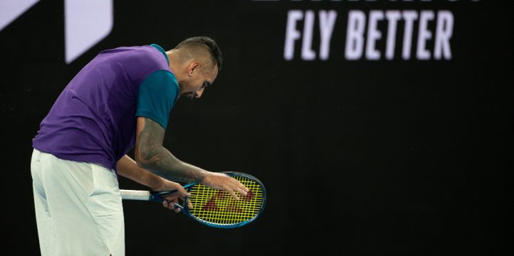 Nick Kyrgios bows down