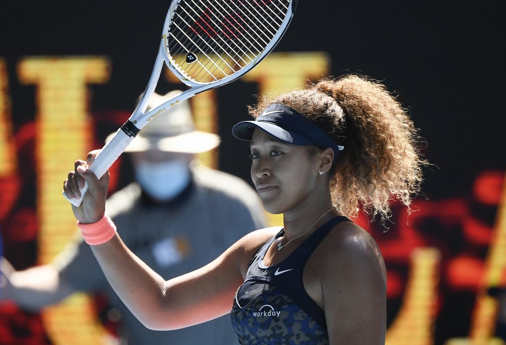 Naomi Osaka celebrates