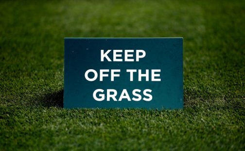Wimbledon grass sign