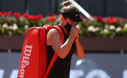 Simona Halep leaves the court