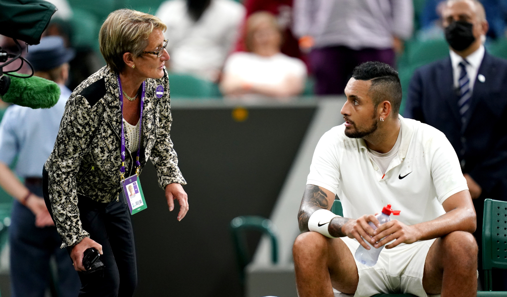 Nick Kyrgios speaks to Wimbledon official
