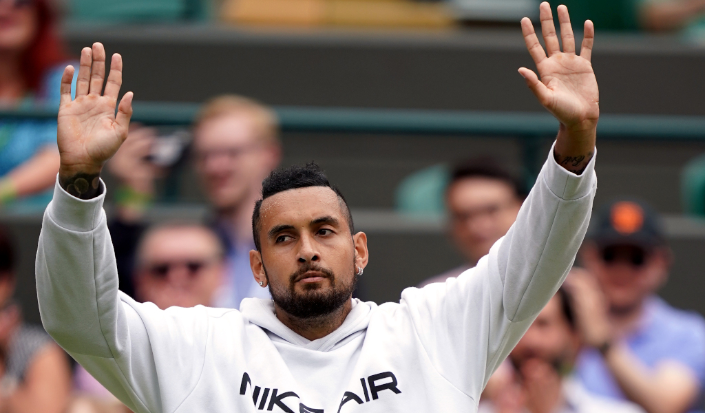 Nick Kyrgios waves goodbye