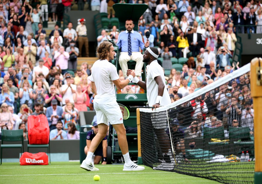Stefanos Tsitsipas and Frances Tiafoe at the net