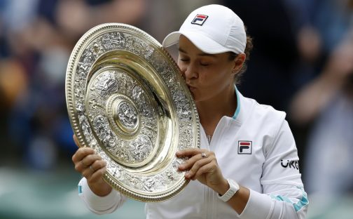 Ashleigh Barty kisses Wimbledon trophy