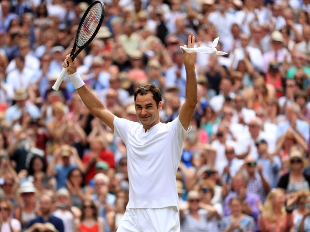 Roger Federer celebrates on centre court