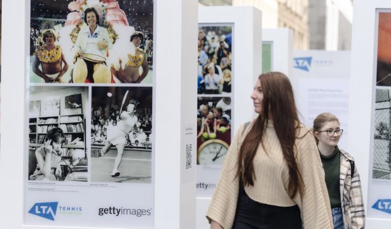 Visitors to the LTA/Getty 'She Rallies' exhibition in Glasgow