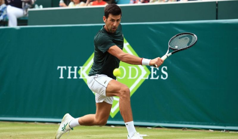 Novak Djokovic playing at The Boodles exhibition event at Stoke Park