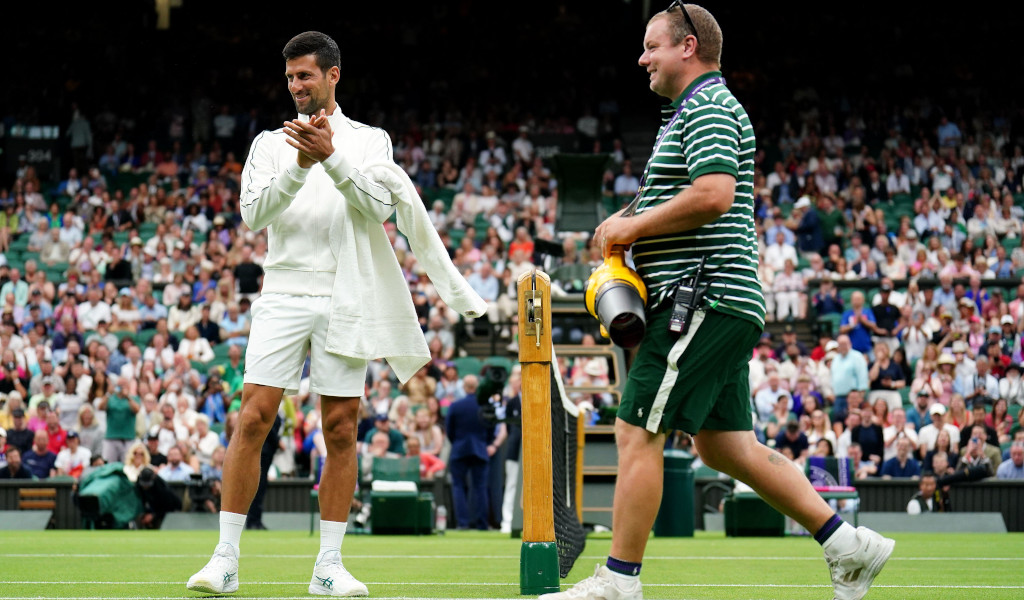 Novak Djokovic applauds
