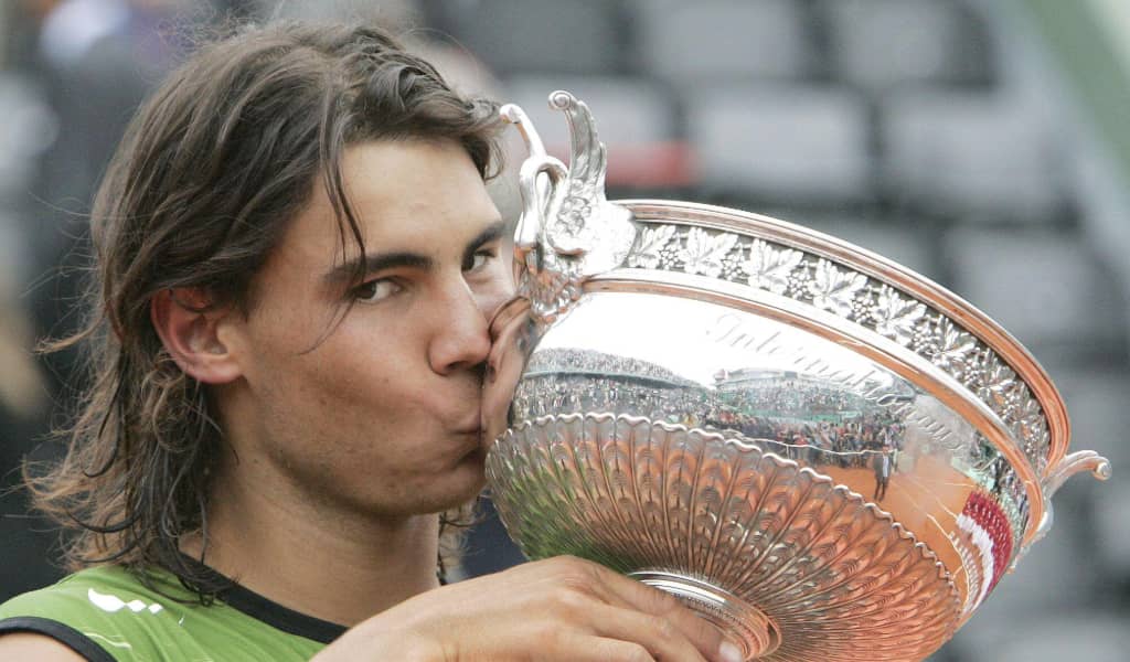 Rafael Nadal with the 2005 French Open trophy