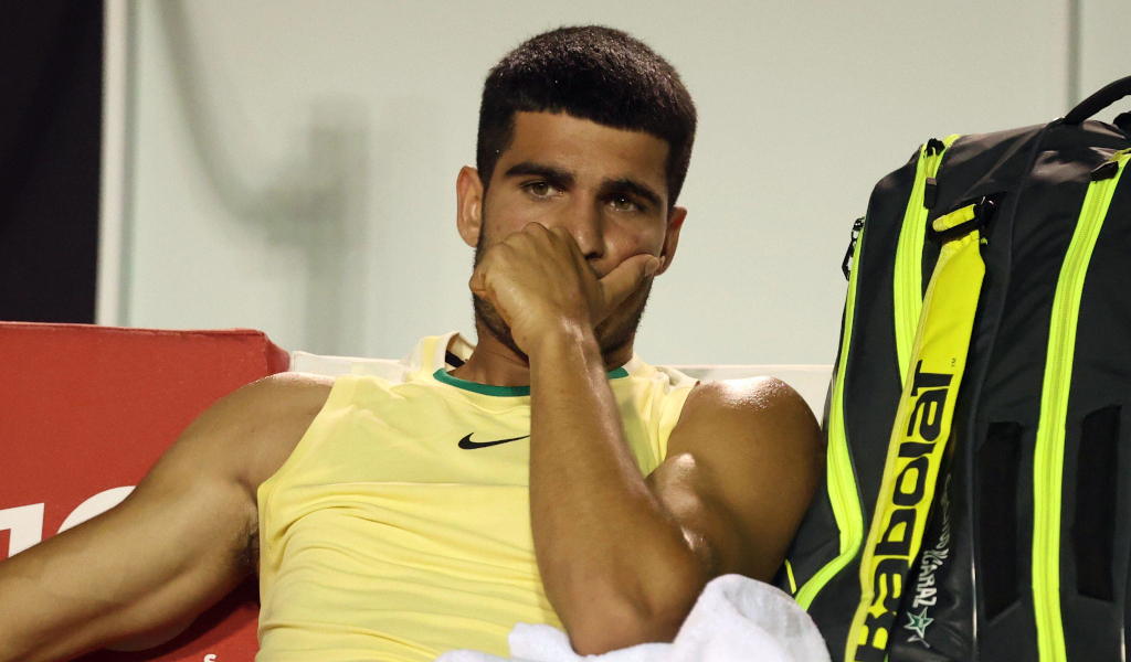Carlos Alcaraz sitting