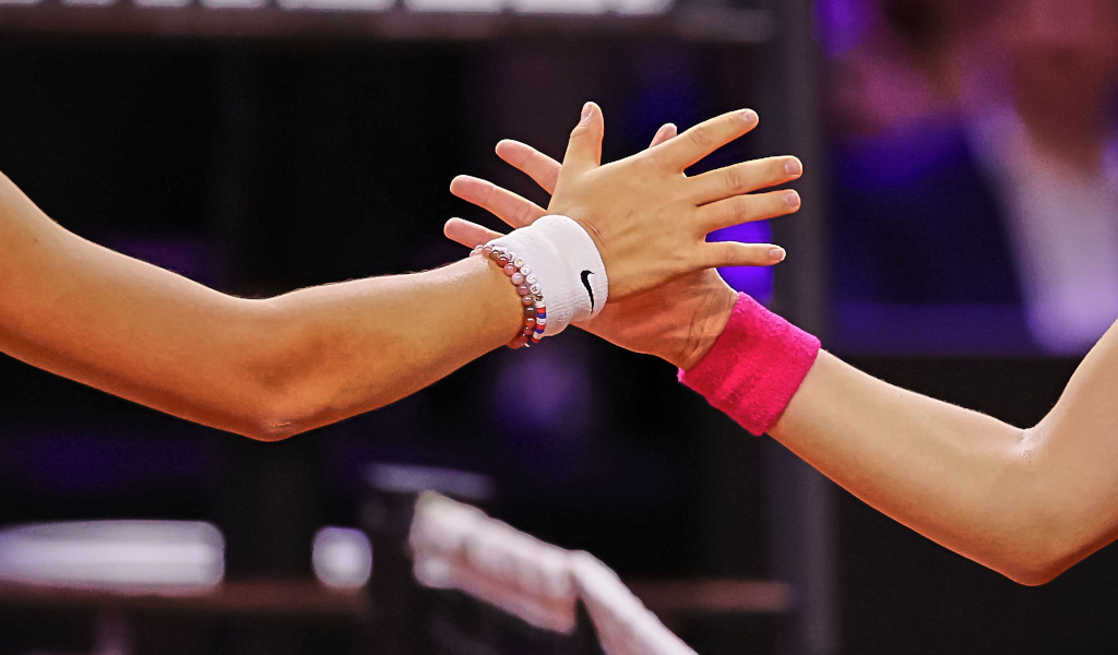 Emma Raducanu and Iga Swiatek post match