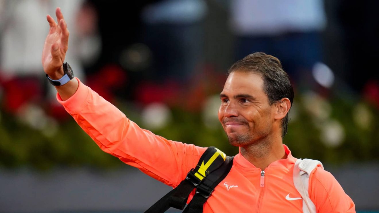 Rafael Nadal, of Spain, waves to the crowd after losing a match against Jiri Lehecka, of Czech Republic, during the Mutua Madrid Open tennis tournament in Madrid, Tuesday, April 30, 2024.