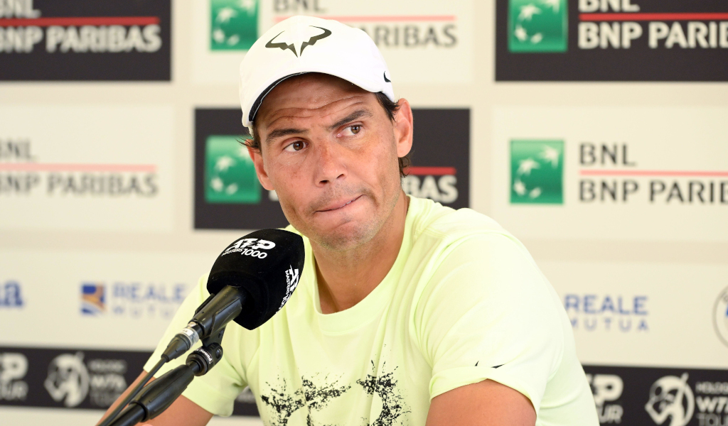 Rafael Nadal talks to the media