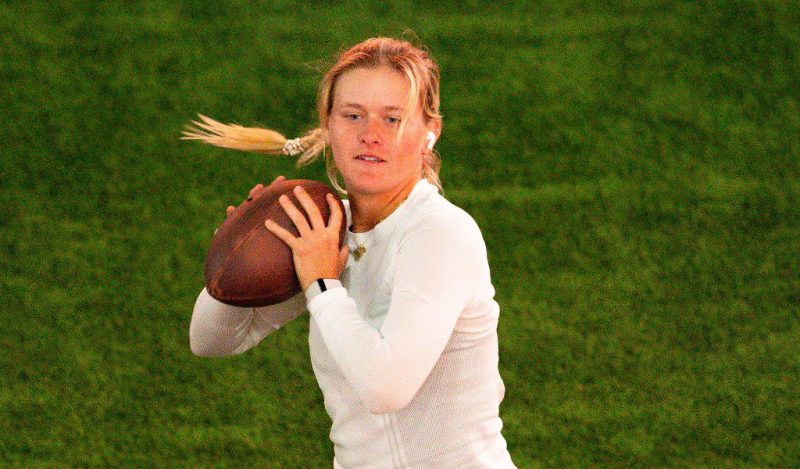 Peyton Stearns throws an American football