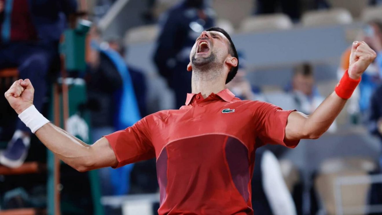 Serbia's Novak Djokovic celebrates winning his third round match of the French Open tennis tournament against Italy's Lorenzo Musetti at the Roland Garros stadium in Paris, Sunday, June 2, 2024