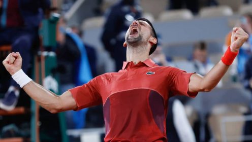 Serbia's Novak Djokovic celebrates winning his third round match of the French Open tennis tournament against Italy's Lorenzo Musetti at the Roland Garros stadium in Paris, Sunday, June 2, 2024