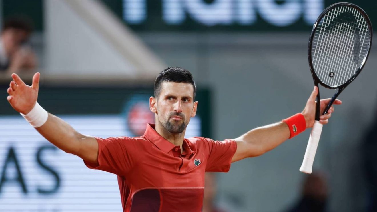 Serbia's Novak Djokovic celebrates winning his third round match of the French Open tennis tournament against Italy's Lorenzo Musetti at the Roland Garros stadium in Paris, Sunday, June 2, 2024