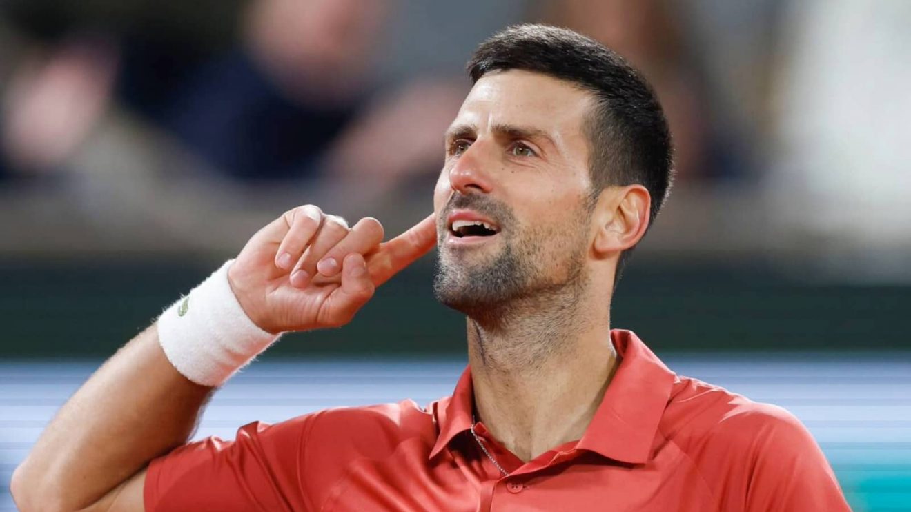Serbia's Novak Djokovic plays the crowd during his third round match of the French Open tennis tournament against Italy's Lorenzo Musetti at the Roland Garros stadium in Paris, Sunday, June 2, 2024