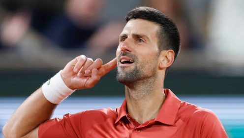 Serbia's Novak Djokovic plays the crowd during his third round match of the French Open tennis tournament against Italy's Lorenzo Musetti at the Roland Garros stadium in Paris, Sunday, June 2, 2024