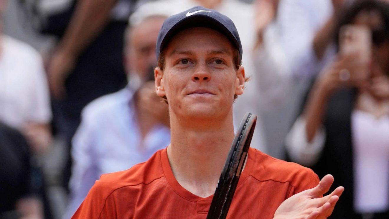 Italy's Jannik Sinner celebrates as he won the quarterfinal match of the French Open tennis tournament against Bulgaria's Grigor Dimitrov at the Roland Garros stadium in Paris