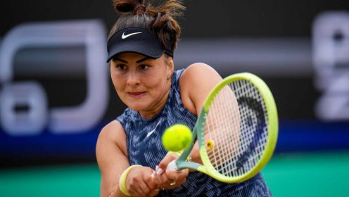 Bianca Andreescu strikes the ball during a match