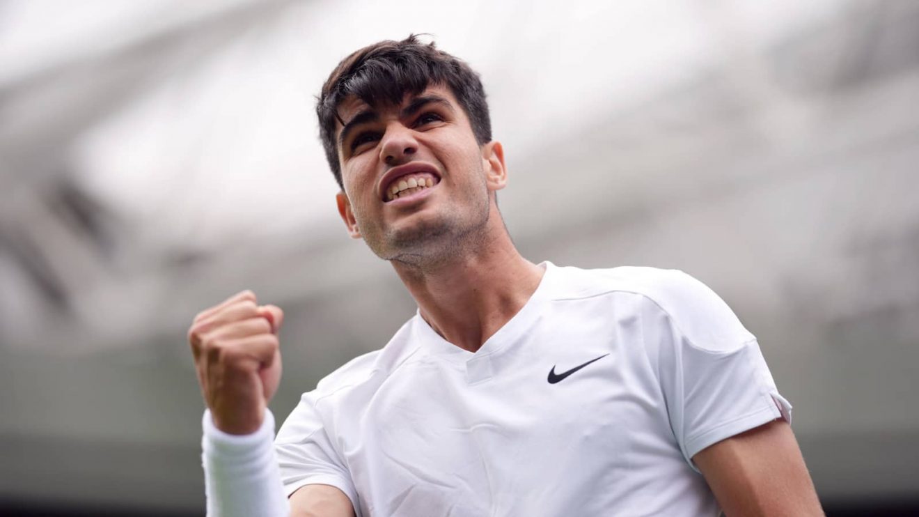 Carlos Alcaraz celebrates during his match at Wimbledon in 2024