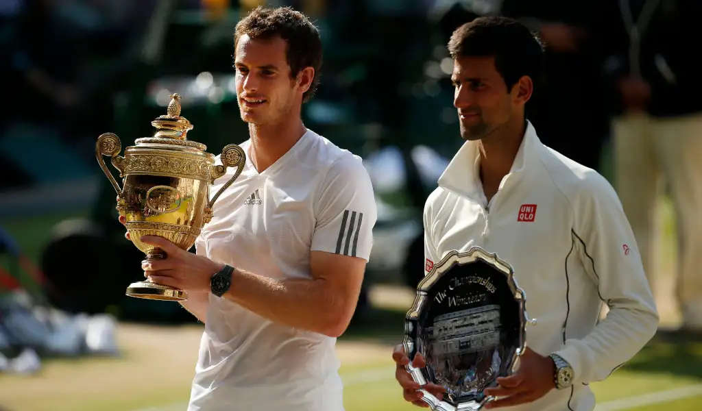 Andy Murray and Novak Djokovic with their Wimbledon trophies