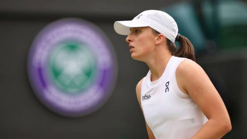 Iga Swiatek looks on during her loss to Yulia Putintseva at Wimbledon in 2024