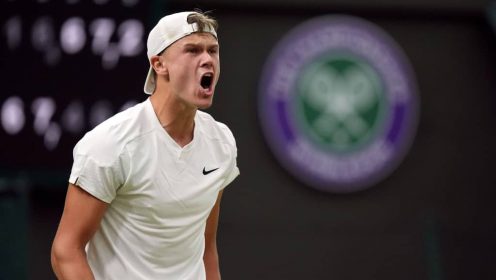 Holger Rune celebrates in his win against Quentin Halys at Wimbledon in 2024