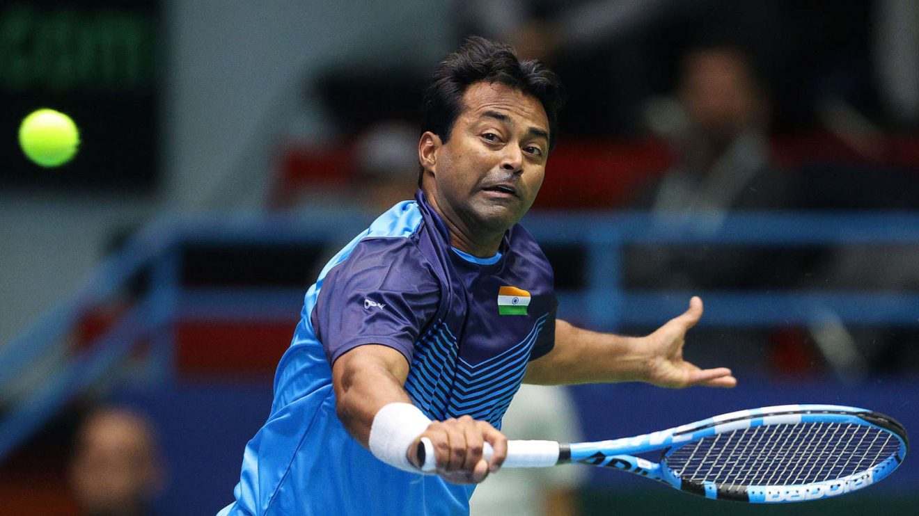 Leander Paes plays a shot