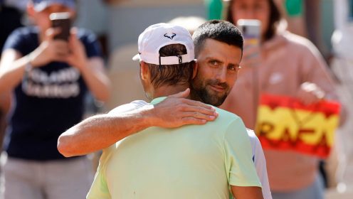 Novak Djokovic hugs Rafael Nadal