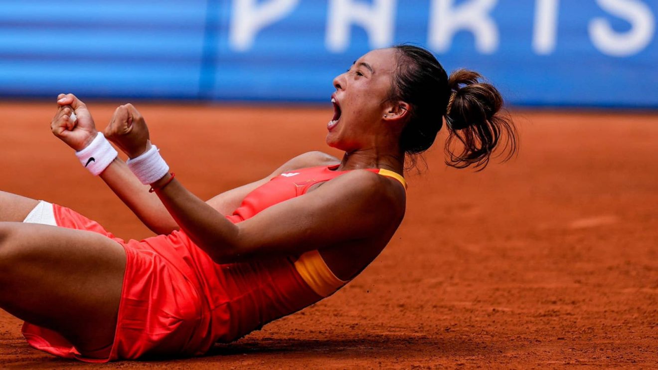 Zheng Qinwen celebrates beating Iga Swiatek to reach the gold medal match at the 2024 Paris Olympics