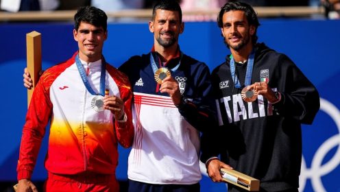 Novak Djokovic, Carlos Alcaraz, and Lorenzo Musetti on the Paris 2024 podium.