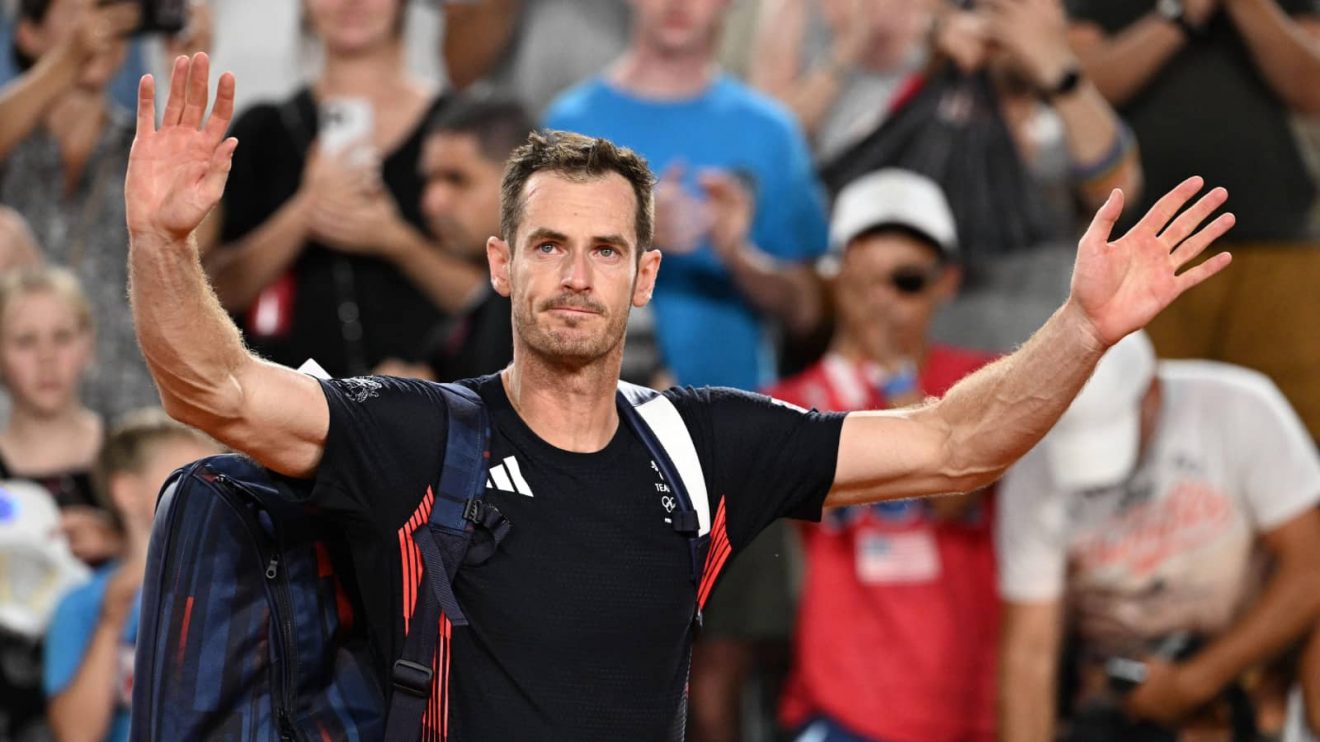 Andy Murray waves goodbye after his last-ever match at the 2024 Paris Olympics