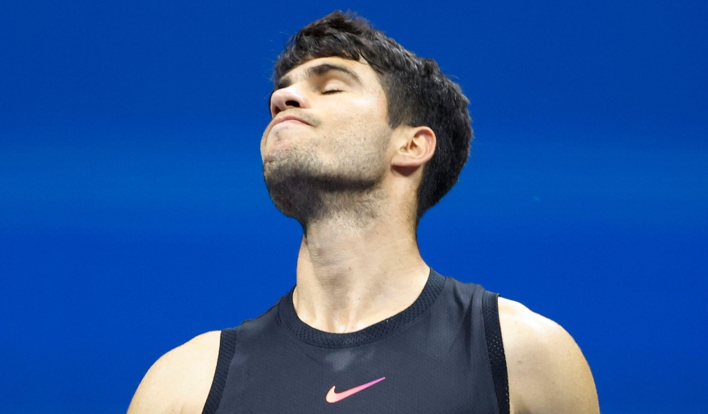 Carlos Alcaraz reacts during his 2024 US Open defeat.