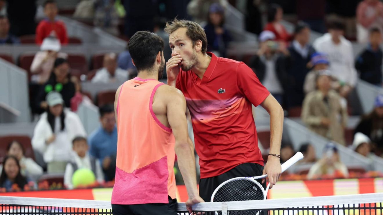 Daniil Medvedev speaks to Carlos Alcaraz after their match at the China Open in Beijing