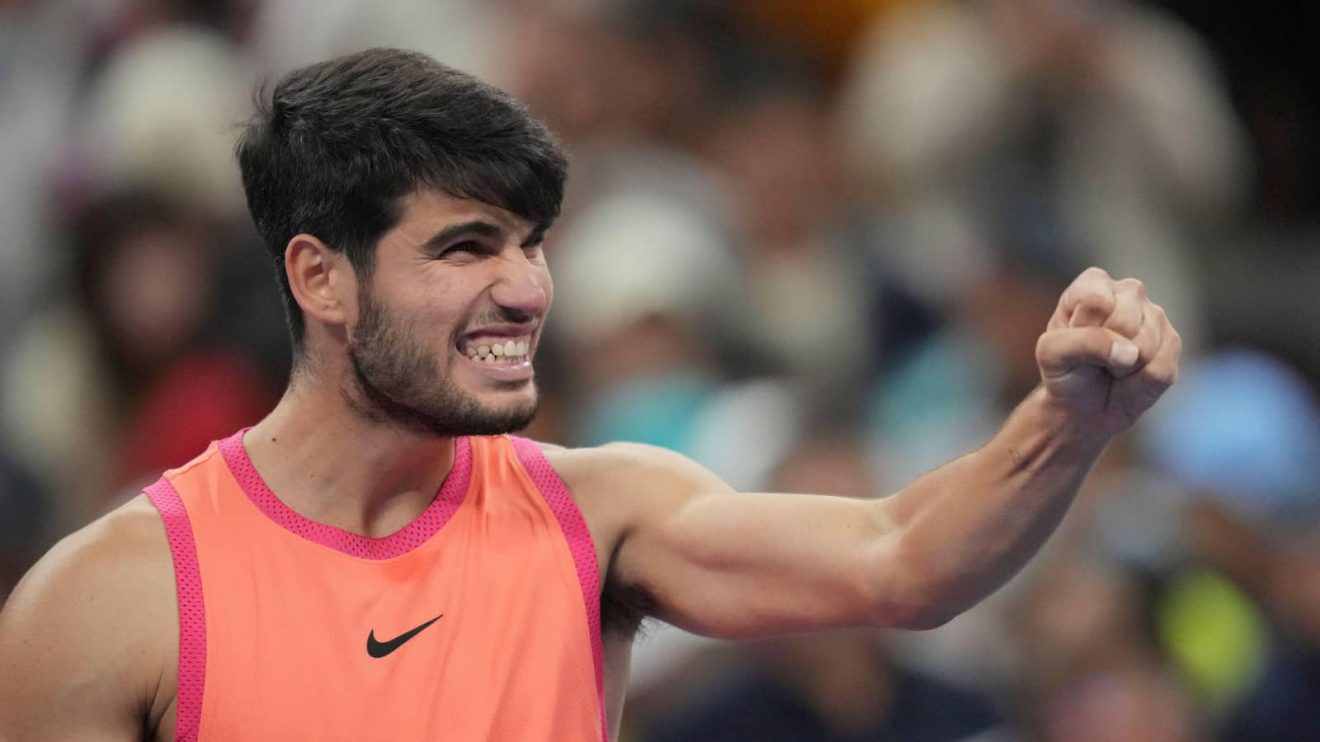 Carlos Alcaraz reacts after winning the China Open in Beijing