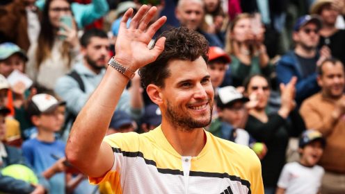 Dominic Thiem waves to the crowd after his final French Open match in May 2024.