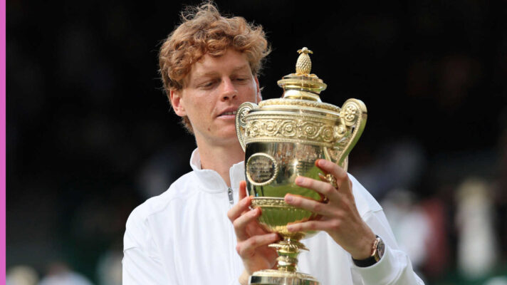 Jannik Sinner holds the Wimbledon trophy