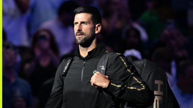 Novak Djokovic looks on